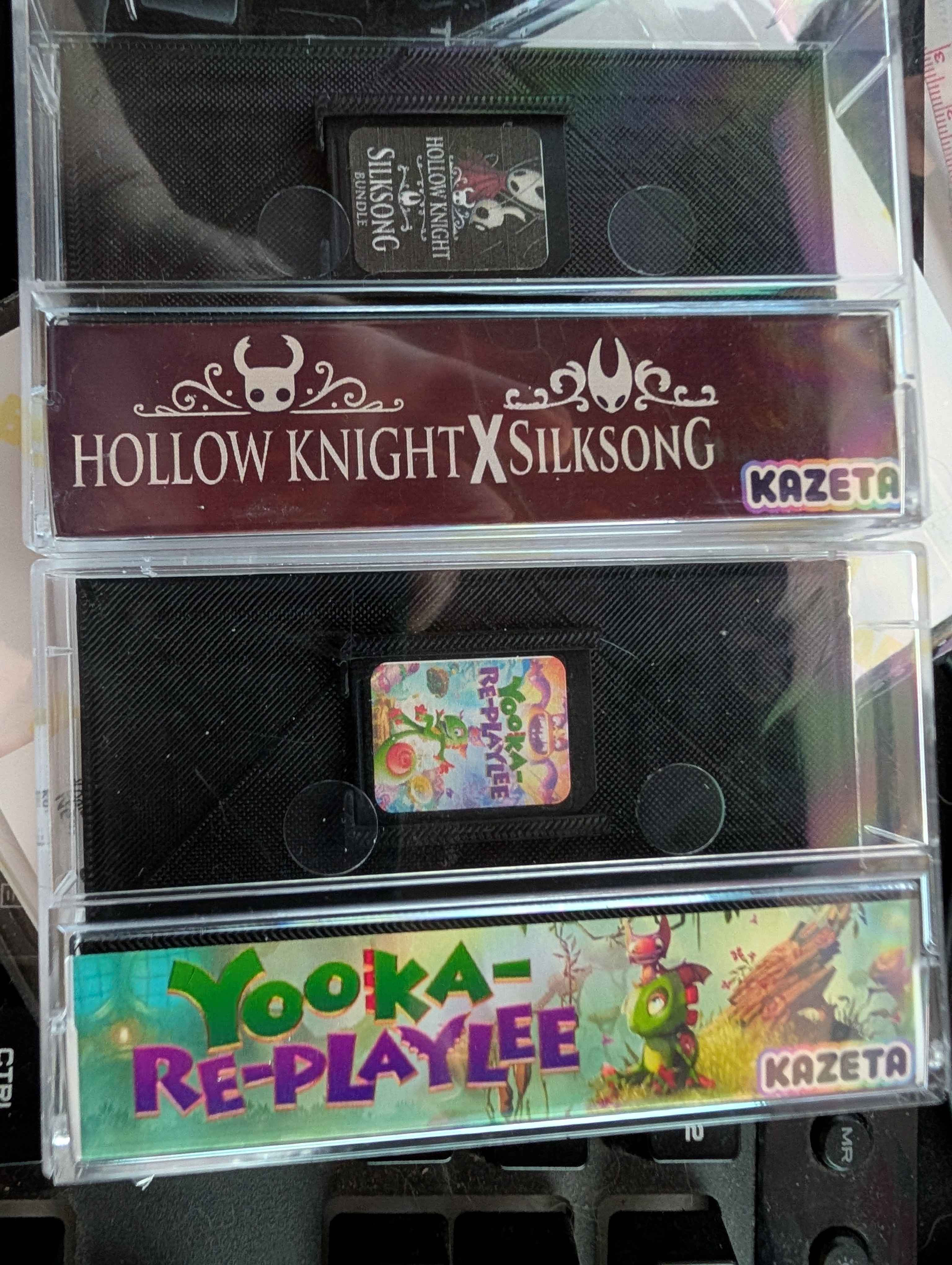 Hollow Knight Silksong and Yooka Replaylee - cartridges