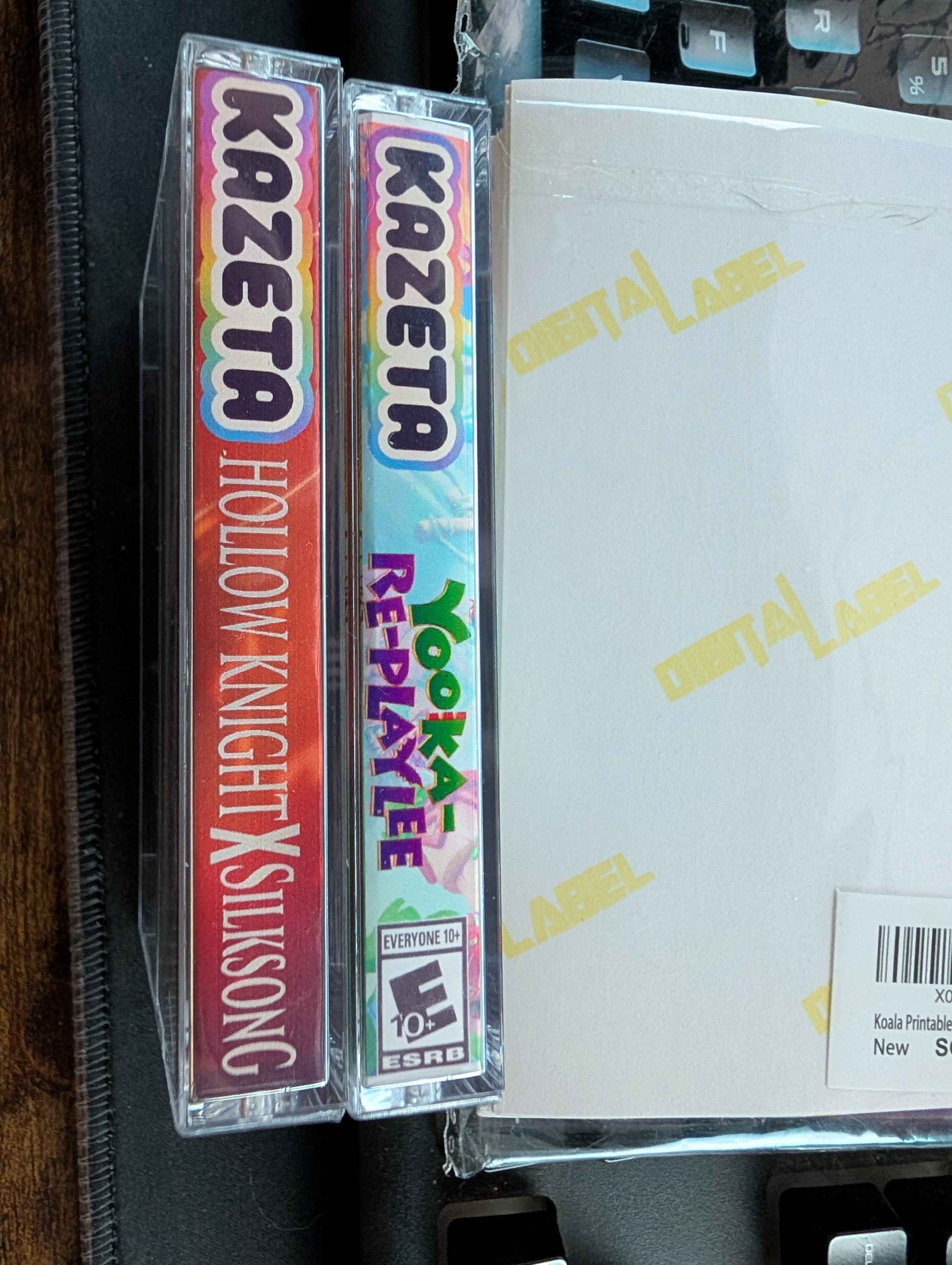 Hollow Knight Silksong and Yooka Replaylee - case spines